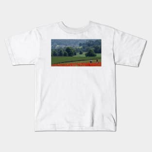 Field of poppys  near baslow in derbyshire with chatsworth house in the distance Kids T-Shirt